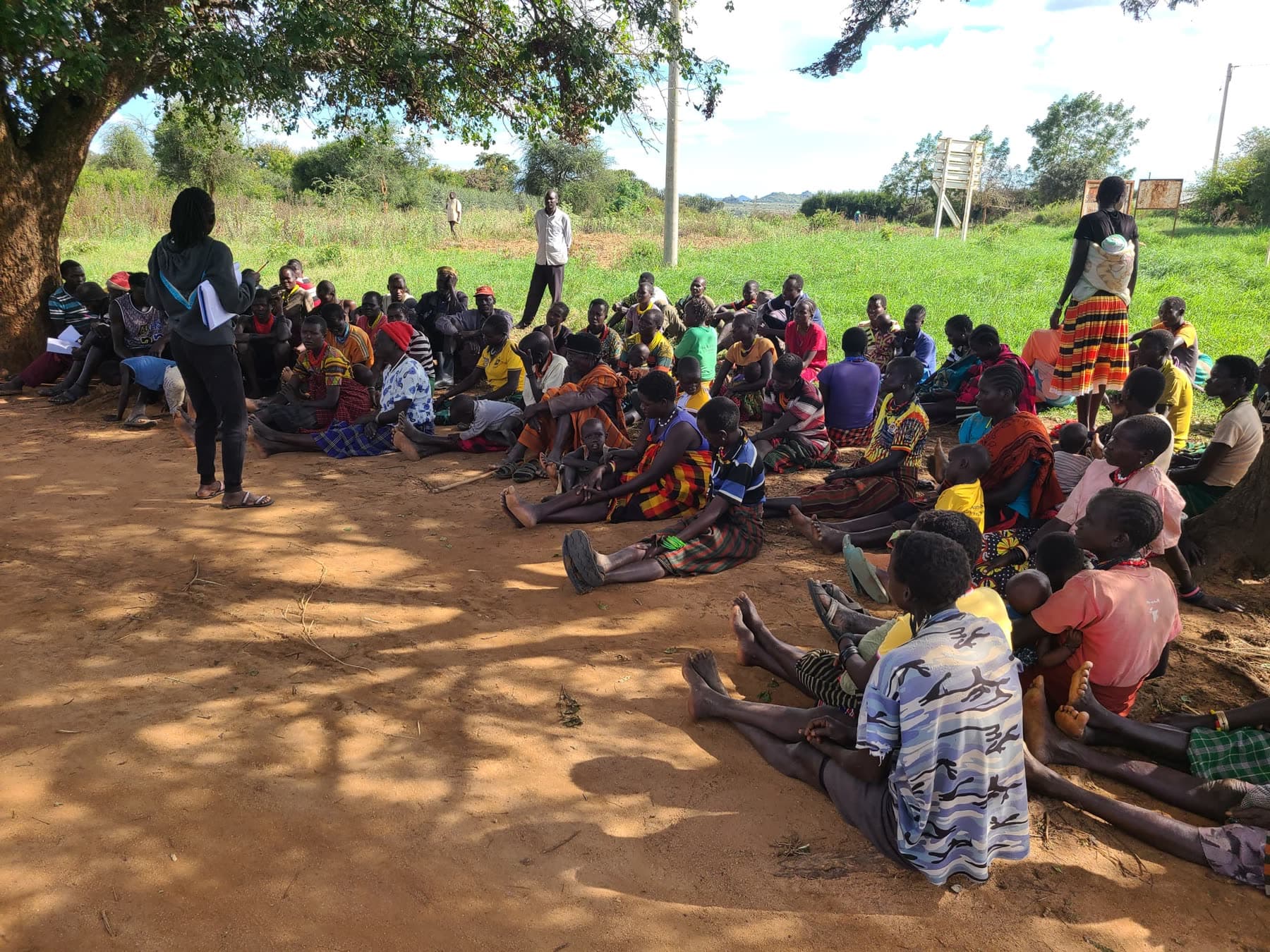 Community members attending a gender training in Kotido